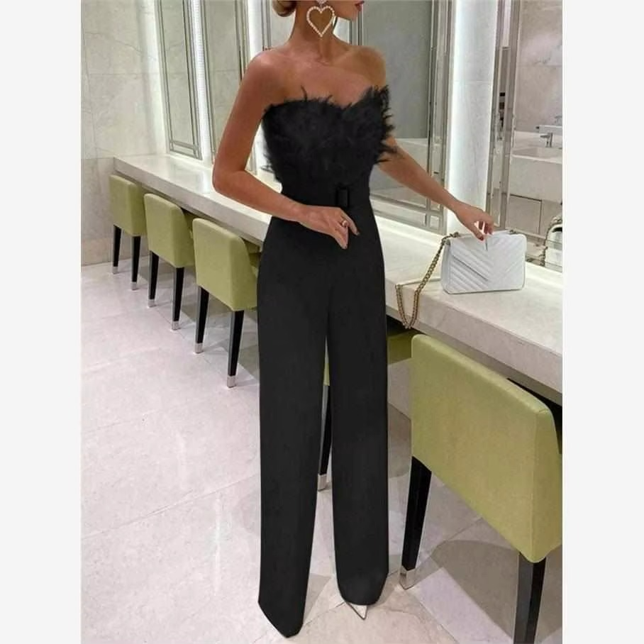 Black feather jumpsuit bare shoulder cinched waist diamond embellished wide leg party look