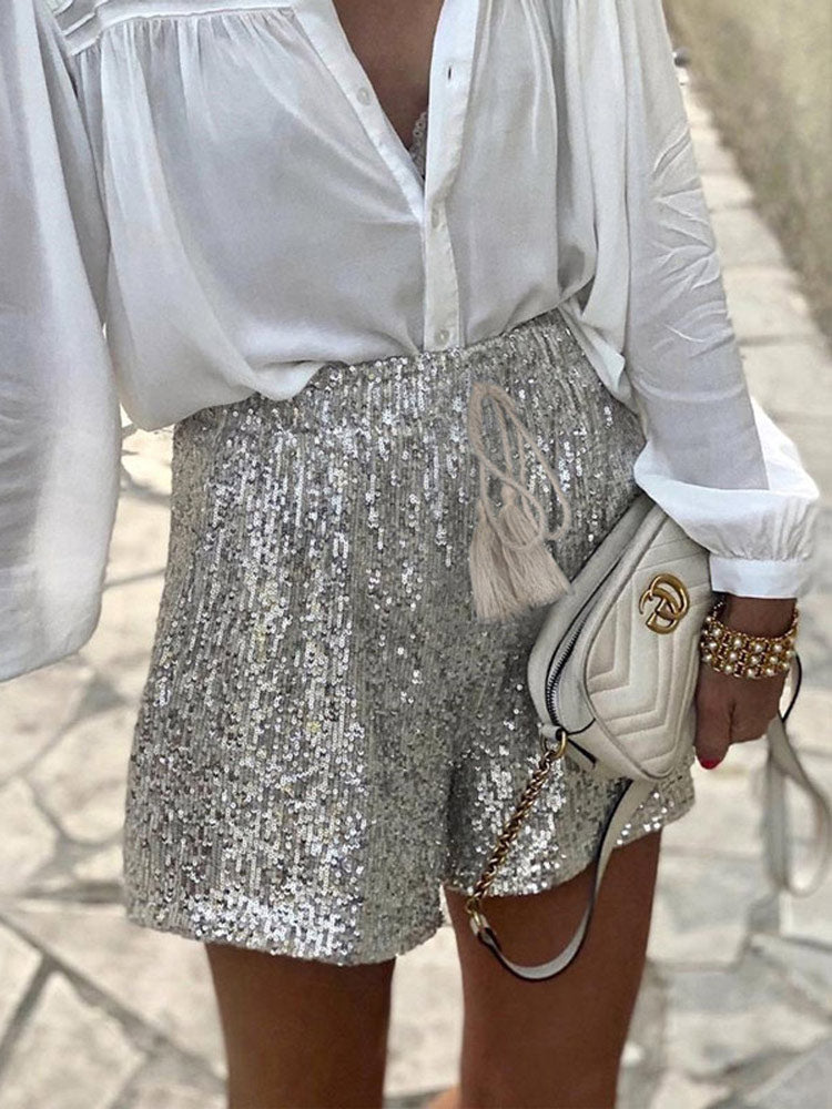 Women's silver sequin high-waist drawstring shorts with satin finish and sparkling party-ready glamour