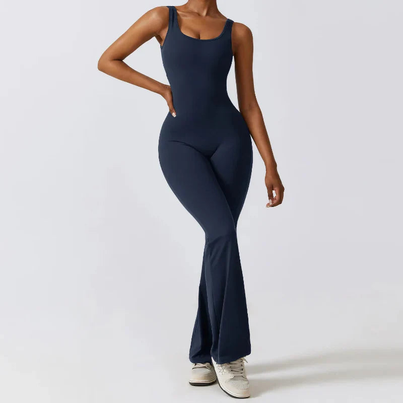 Women's black seamless training jumpsuit with compression fit and sculpted silhouette for high-intensity workouts