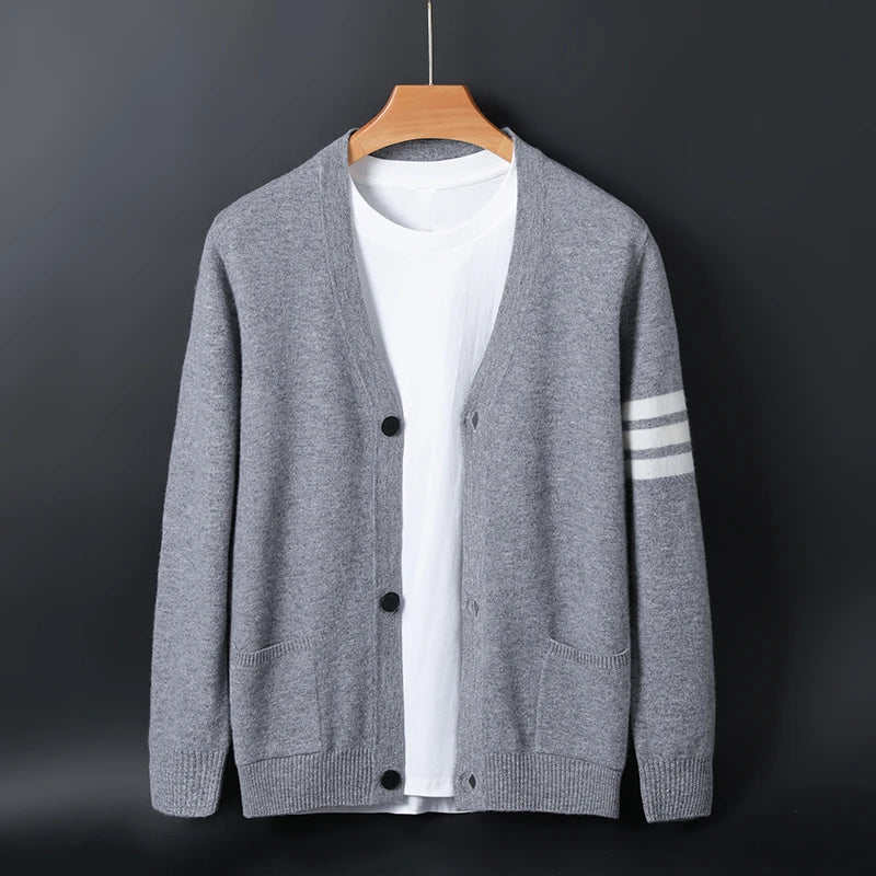 Women's striped sleeve knit cardigan with button front, ribbed trim, and casual relaxed fit