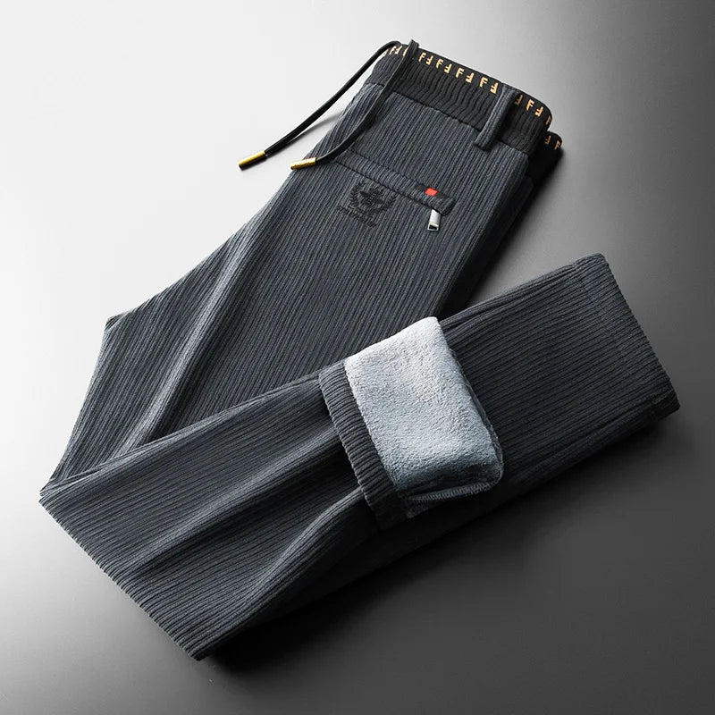 Men's brown corduroy jogger pants with Sherpa lining, drawstring waist, relaxed tapered fit