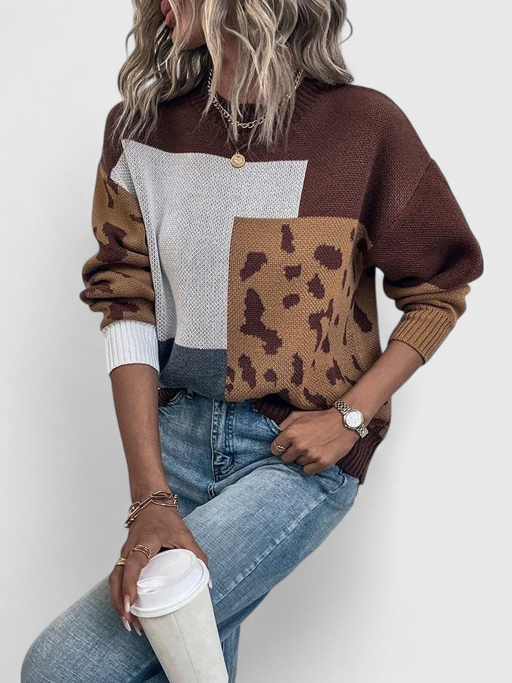 Colorblock patchwork knit sweater in warm earthy tones, relaxed fit with bold paneling
