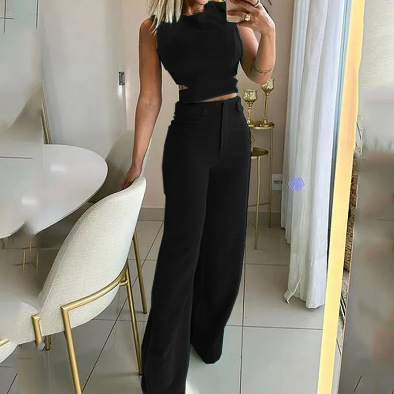 Women black crop top two-piece set high-waisted slim pants with cut-out detail chic summer outfit