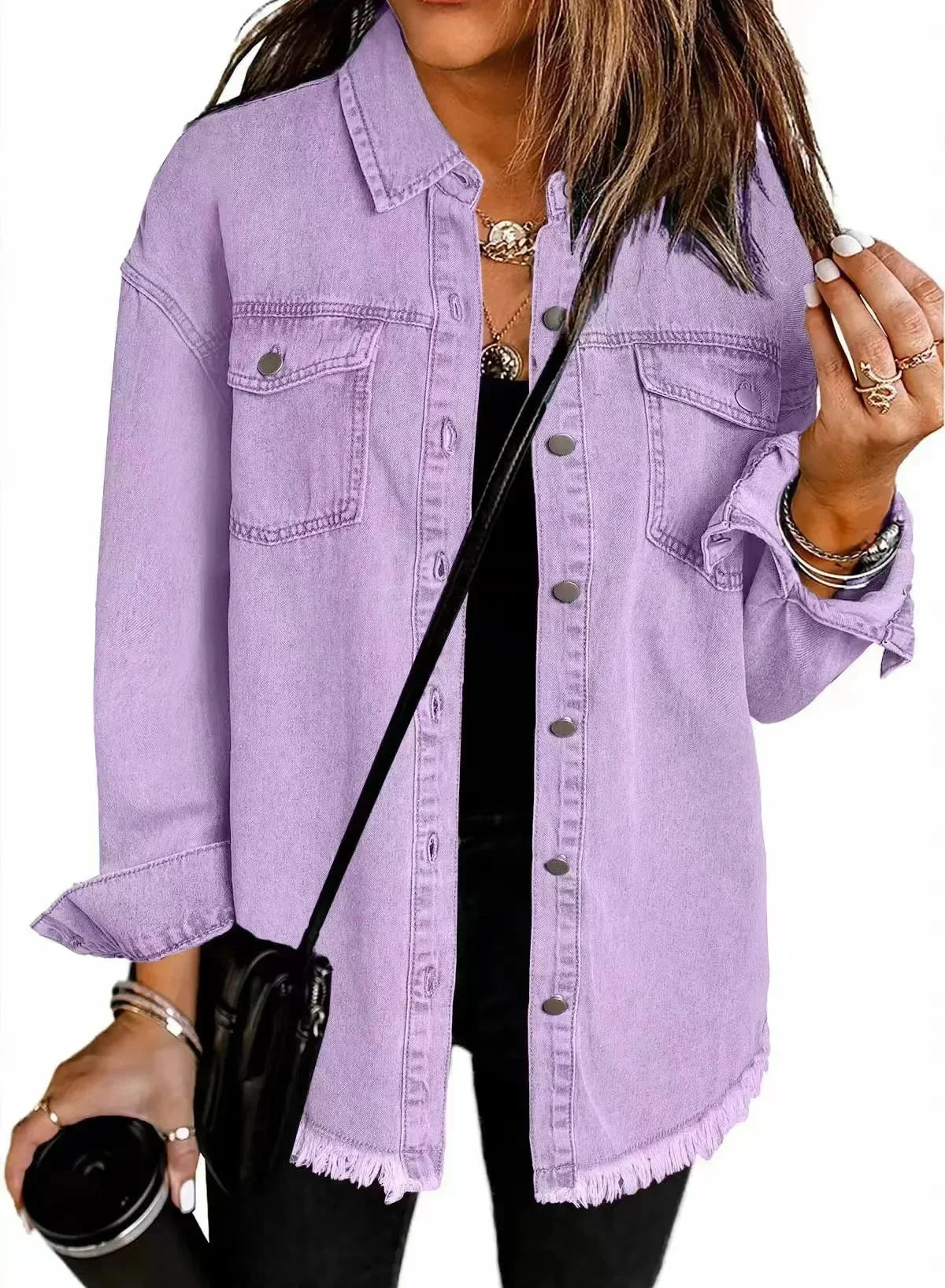 Women's relaxed fit washed denim shirt jacket with button-down front, chest pockets, and fringe hem
