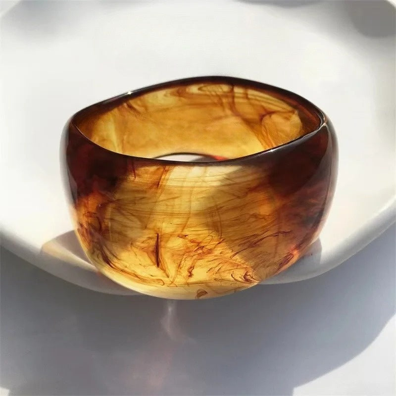 Genevieve marble-patterned acrylic bangle irregular silhouette stackable statement bracelet for women
