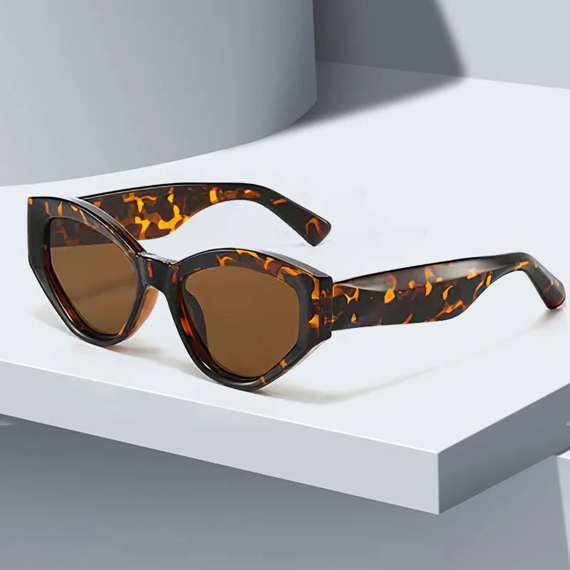 Sable brown glossy acetate cat-eye sunglasses bold sculpted edges UV400 protection women