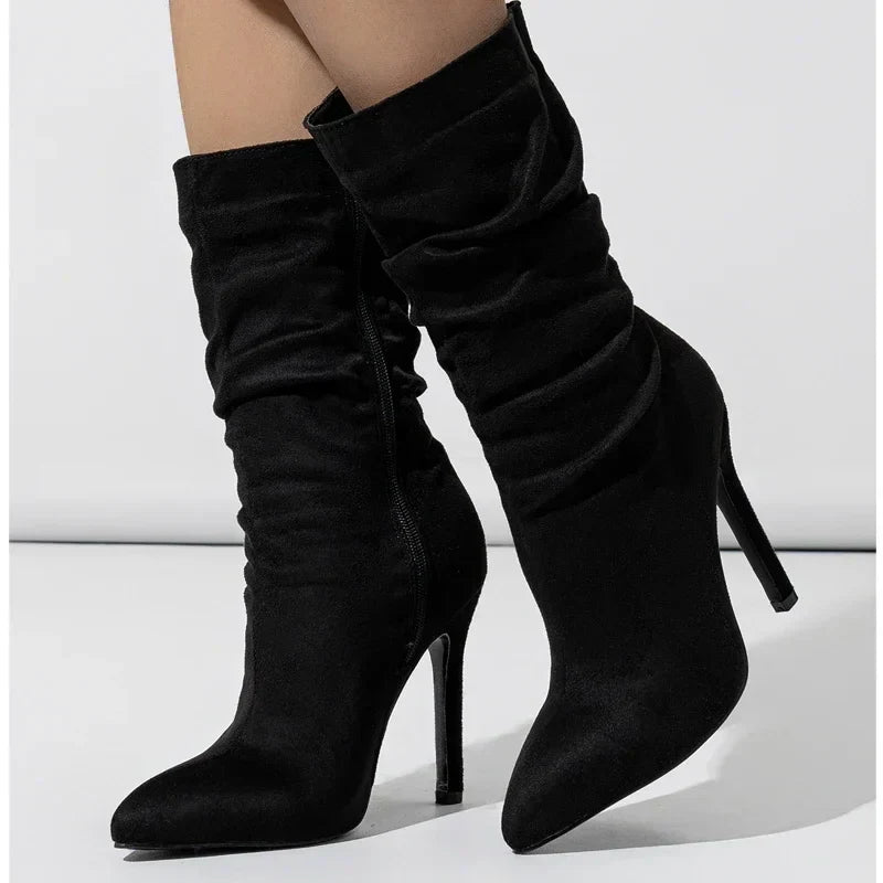Black velvet stiletto boot with slouchy shaft and pointed toe, chic evening heel for women