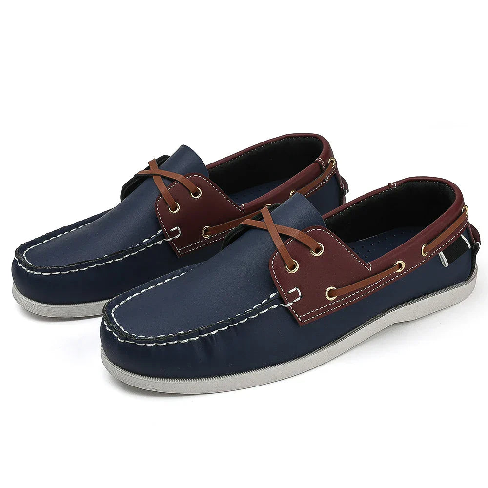 Men's two-tone navy synthetic leather slip-on boat shoes with cushioned EVA foam sole