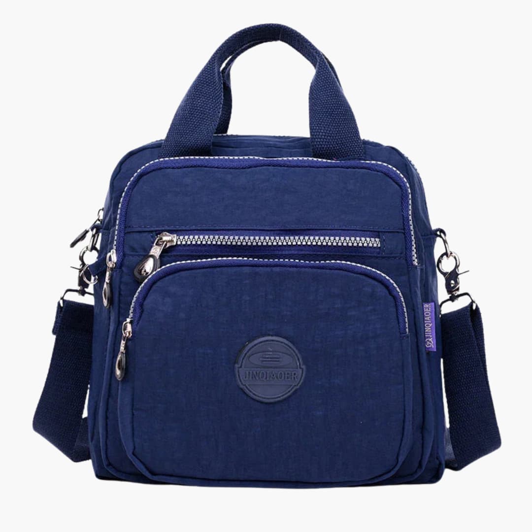 Women's minimalist shoulder bag adjustable crossbody strap multiple pockets sleek everyday travel versatile