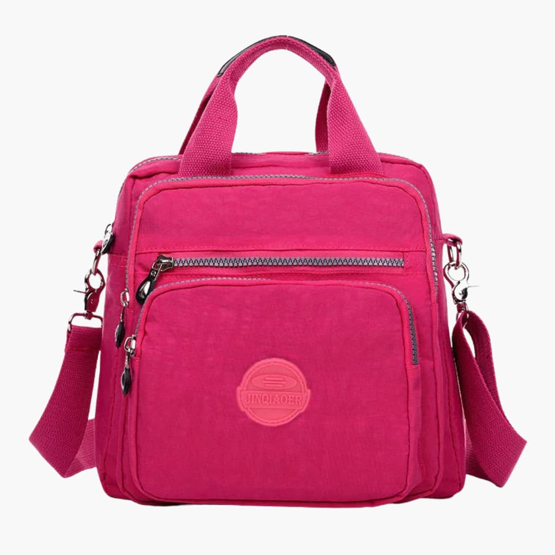 Women's minimalist shoulder bag with adjustable strap, multiple pockets, sleek crossbody design for travel