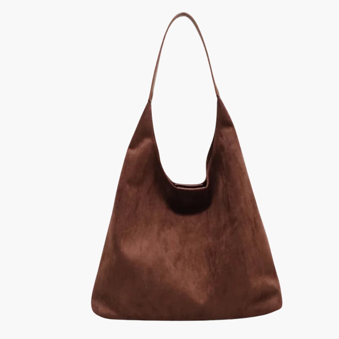 Sleek modern women's shoulder handbag in neutral tone with adjustable strap for everyday versatile style