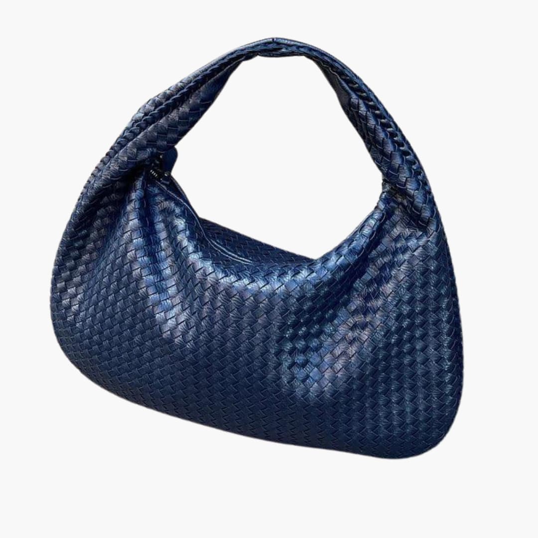 Women's braided woven shoulder bag with structured strap, textured exterior, and secure zipper closure