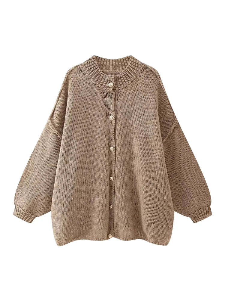 Women's oversized cream button-down cardigan cozy relaxed fit with ribbed hem layering essential