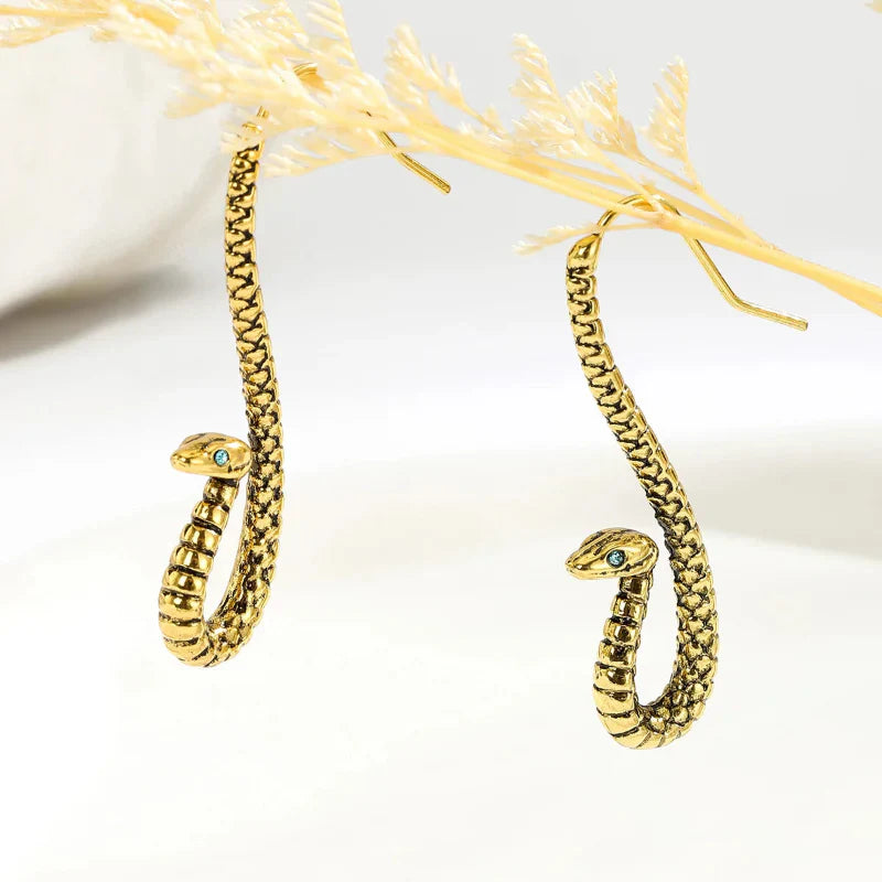 Seraphine sculpted snake earrings coiled serpent silhouette high-polish luminous finish lightweight bold statement