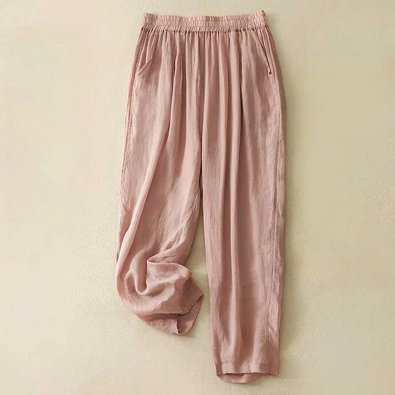 Sage green linen blend women's pants with elastic waist, fluid drape, and side pockets for everyday wear