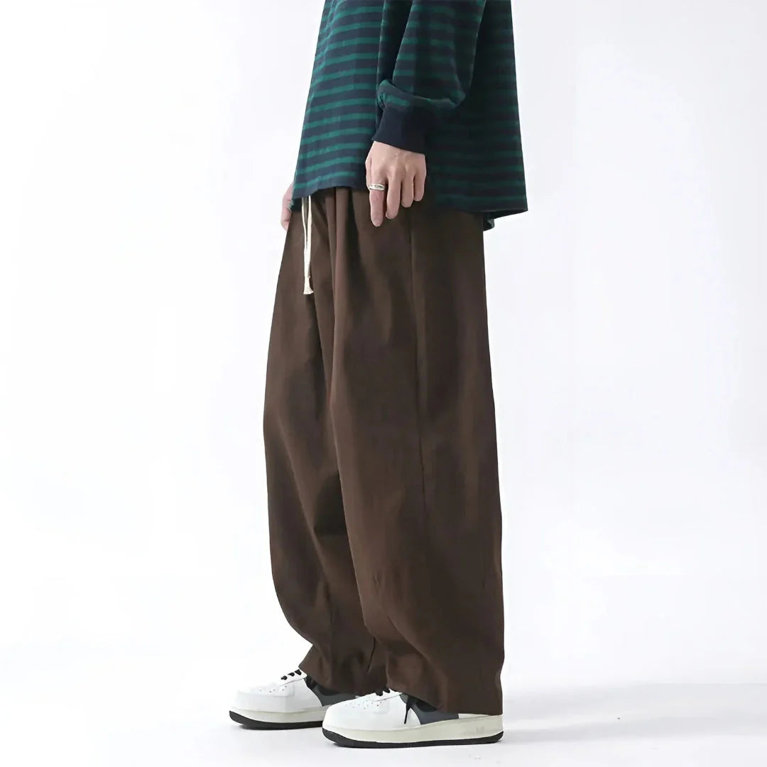 Men's oversized pleated casual pants with adjustable drawstring waist, lightweight relaxed fit