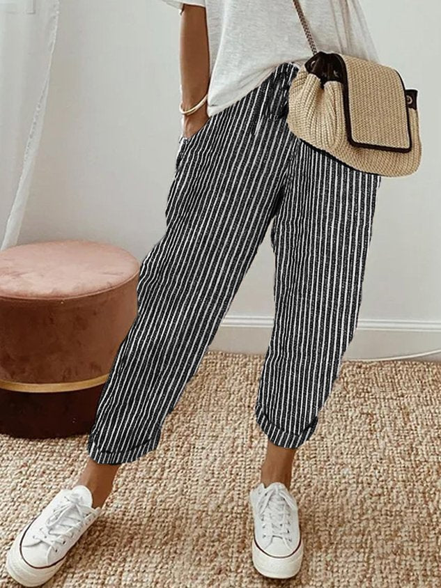 Lightweight breathable linen trousers in neutral tones, relaxed full-length fit with anti-sweat fabric