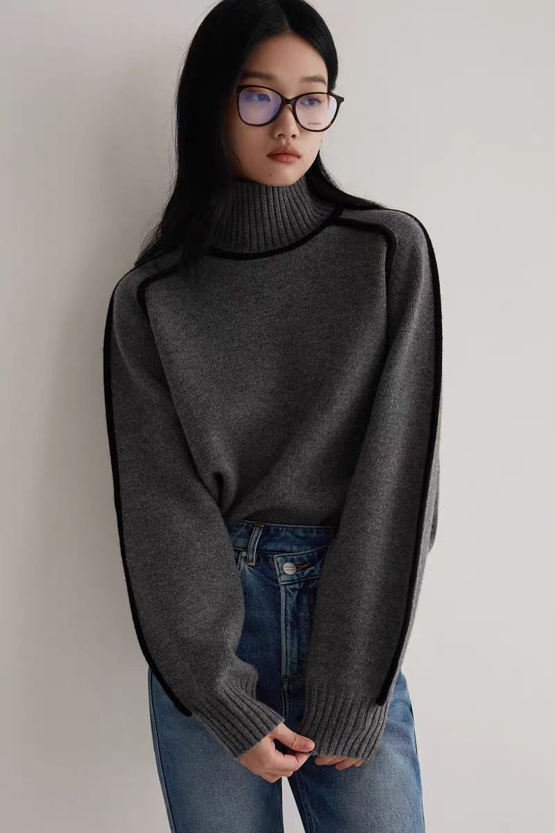 Ivory knitted turtleneck sweater relaxed fit with bold contrast seams cozy soft knit office casual style