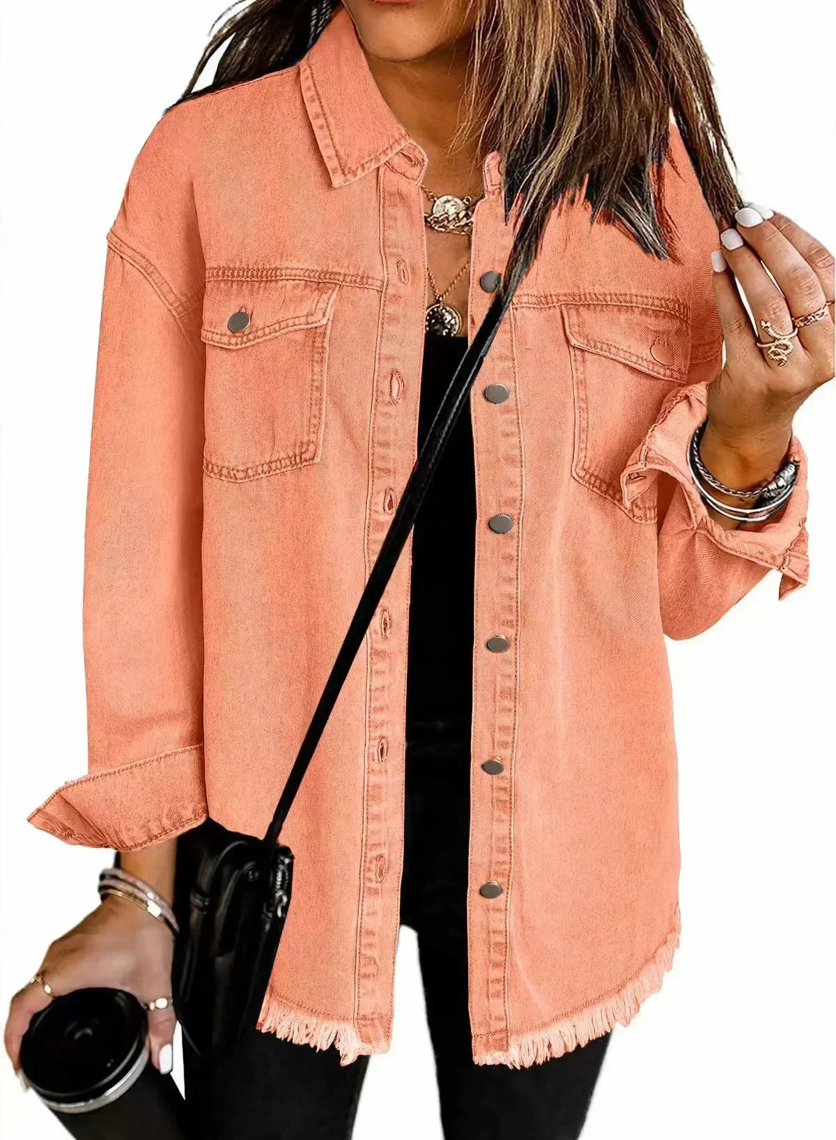 Women's relaxed fit washed denim shirt jacket with button-down front, chest pockets, and fringe hem