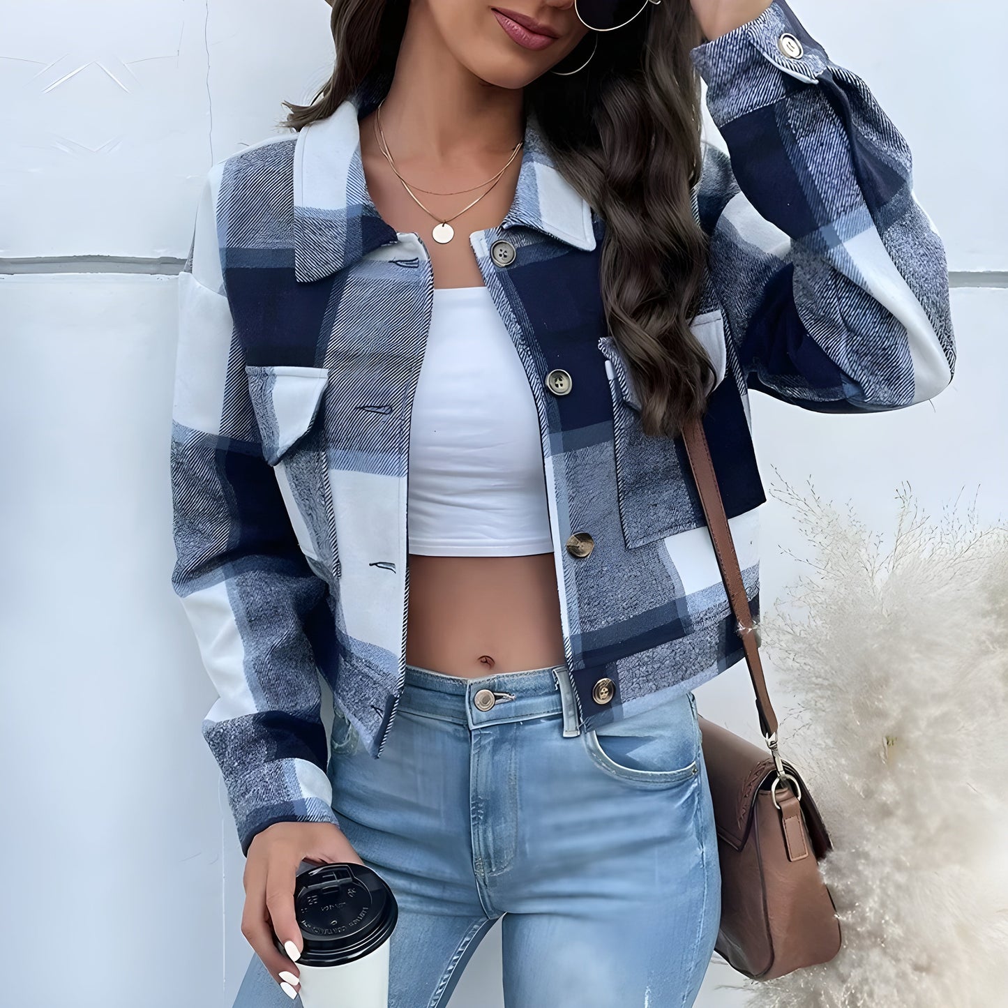 Women's cropped plaid-wash jacket with faux horn buttons, patch pockets, and soft shoulder collar