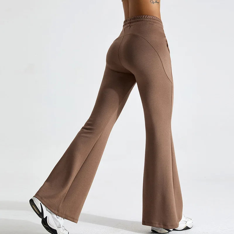 Women's black flared yoga pants high-rise waist stretch performance fabric contour fit breathable