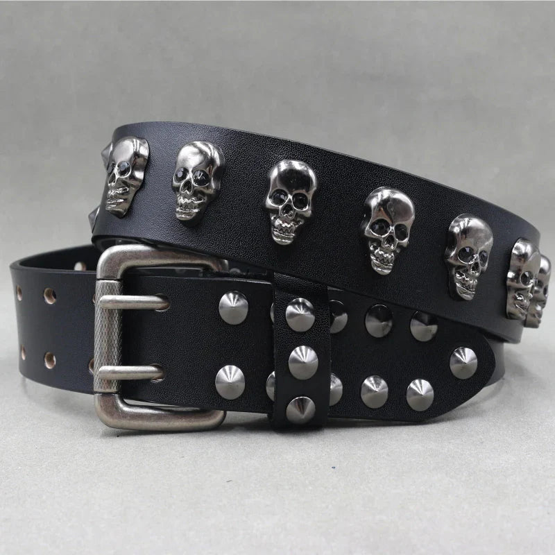 Men's black full-grain leather belt with silver skull studs and adjustable buckle rugged edgy style