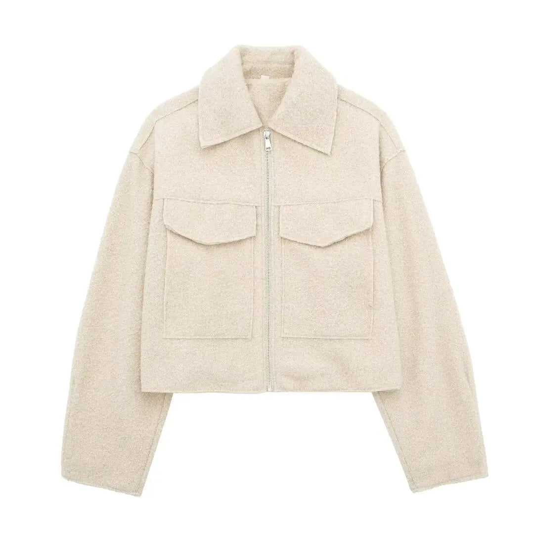 Unisex tailored jacket with front zip pockets and vintage lapel collar for urban style