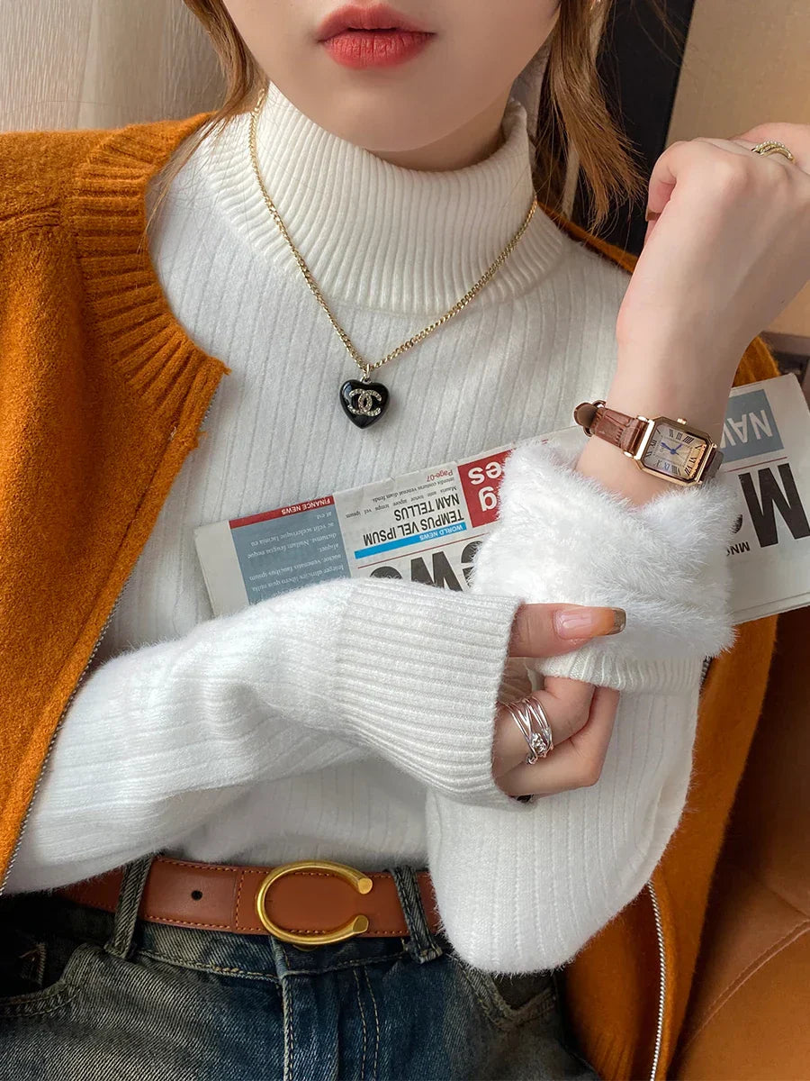 Women's slim fit ribbed knit turtleneck sweater with velvety cuffs and long sleeves