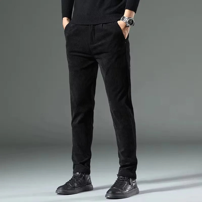 Men's fine-wale corduroy dress pants in stretch fabric with refined slim silhouette