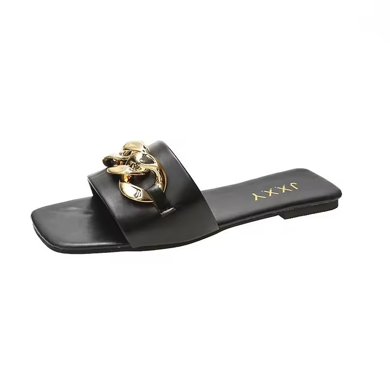 Women's vegan leather slide sandals with bold gold chunky chain accent strap, square toe, chic flat design