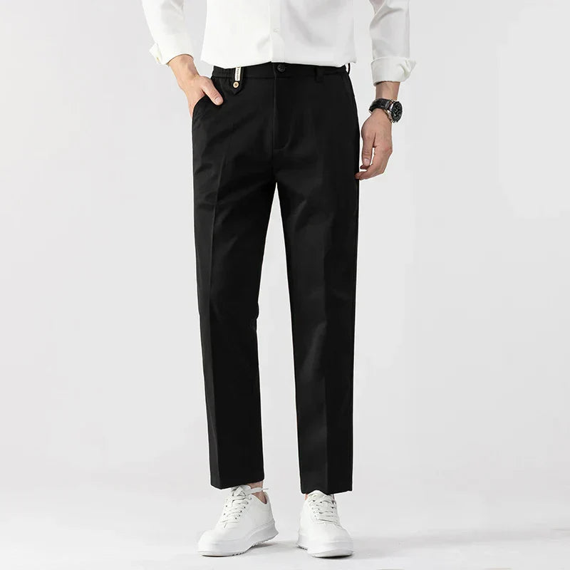 Men's slim fit lightweight dress pants in neutral tone, tailored cut for all-day office comfort