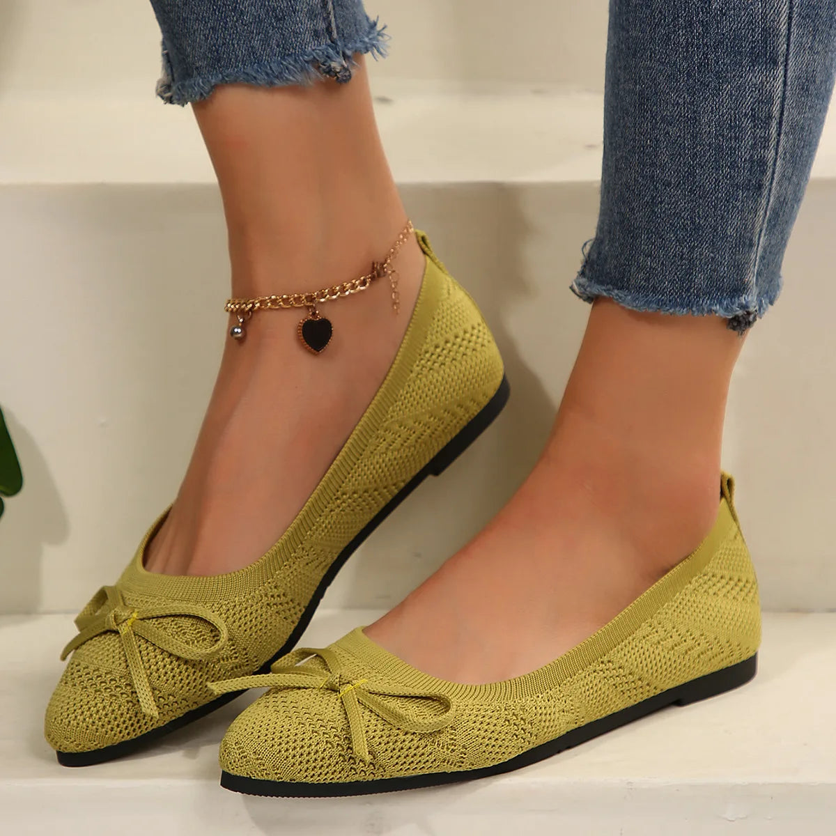 Women's knit flats with tassel bow detail, lightweight breathable mesh upper, casual chic style