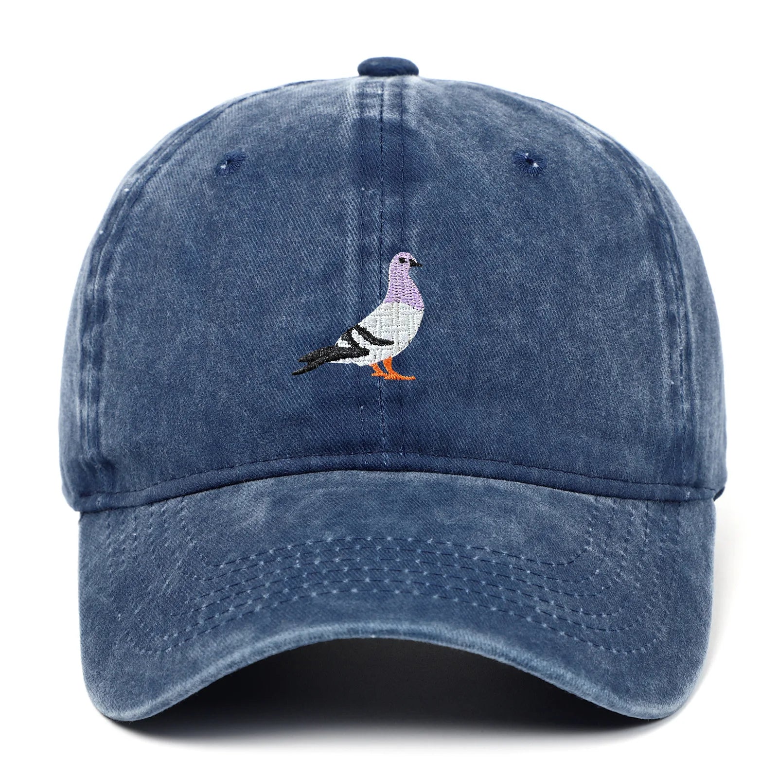 Washed cotton unisex cap in vintage tones with embroidered pigeon motif and adjustable fit