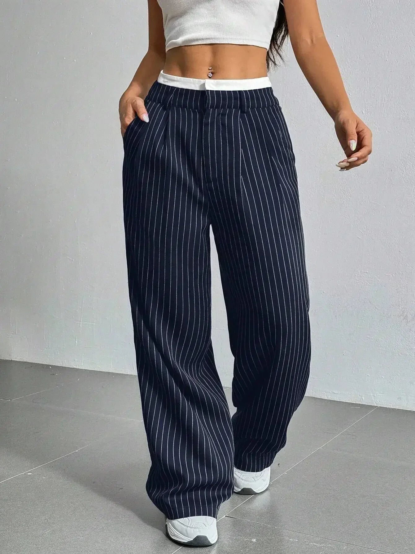 Women's black pinstripe high-waist dress pants with tailored fit and slight stretch for all-day comfort