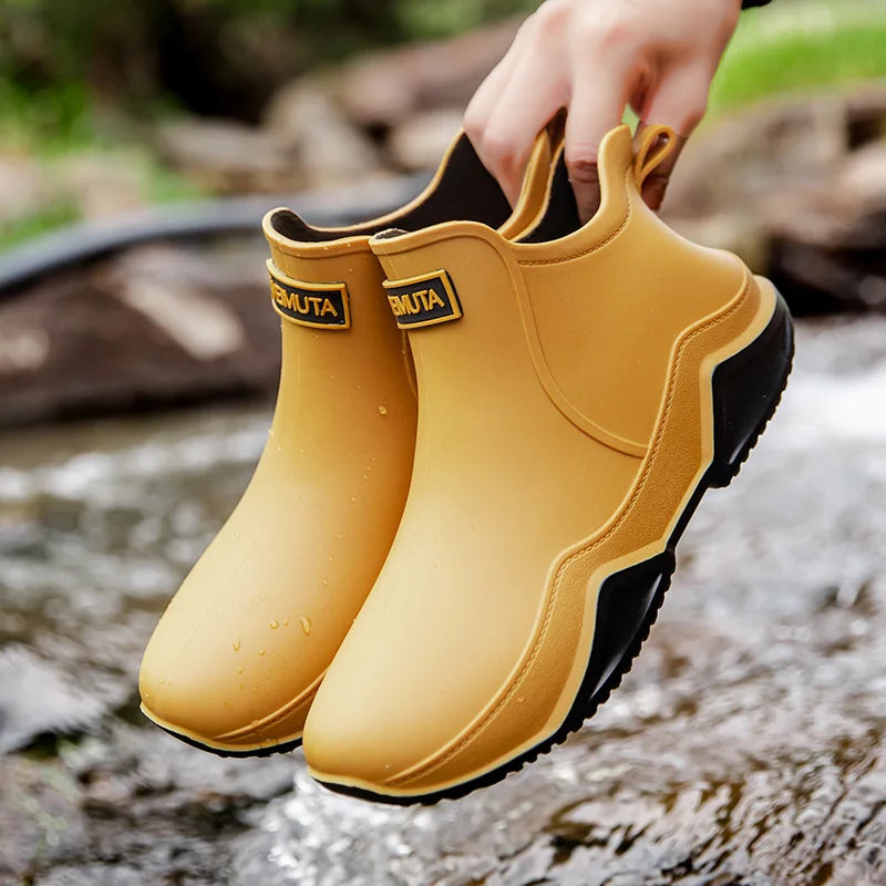 Women's waterproof slip-on outdoor boots in neutral tones, effortless pull-on design for wet trails