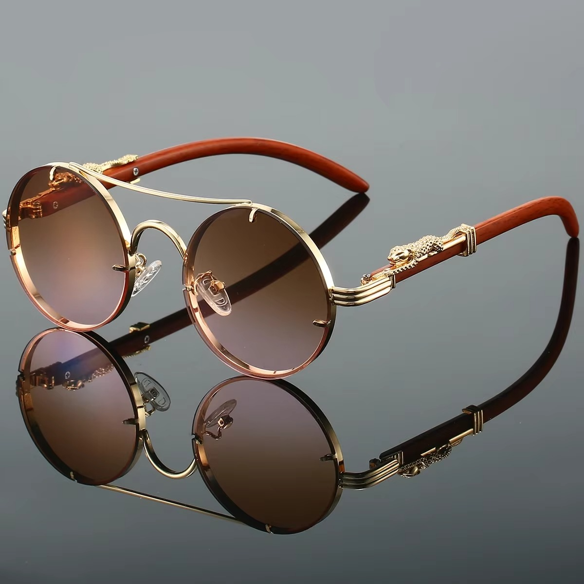 Vintage round unisex sunglasses gold-tone double bridge frame red lenses featherweight