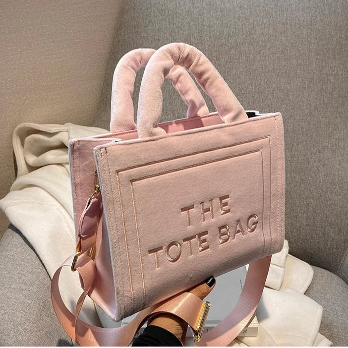Urbann-Vibe velour tote bag with signature letter print, spacious interior, plush texture, modern square silhouette
