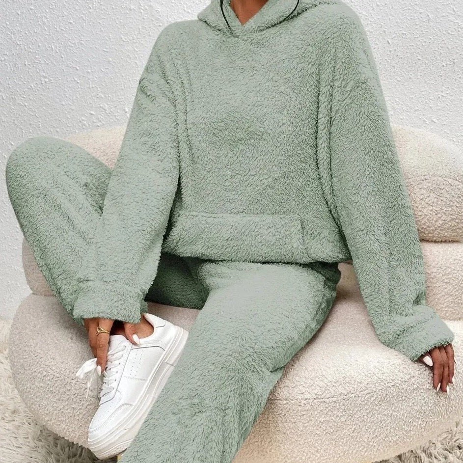 Women's plush two-piece lounge set in cozy ultra-soft fabric, relaxed fit matching top and bottom