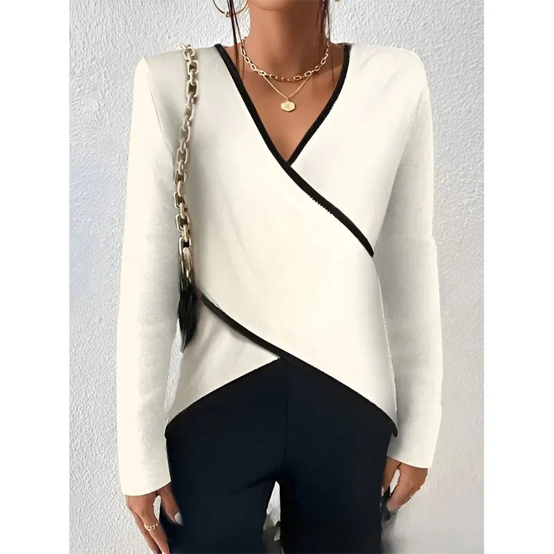 Women's brushed knit wrap blouse asymmetric hem contrast trim draped silhouette