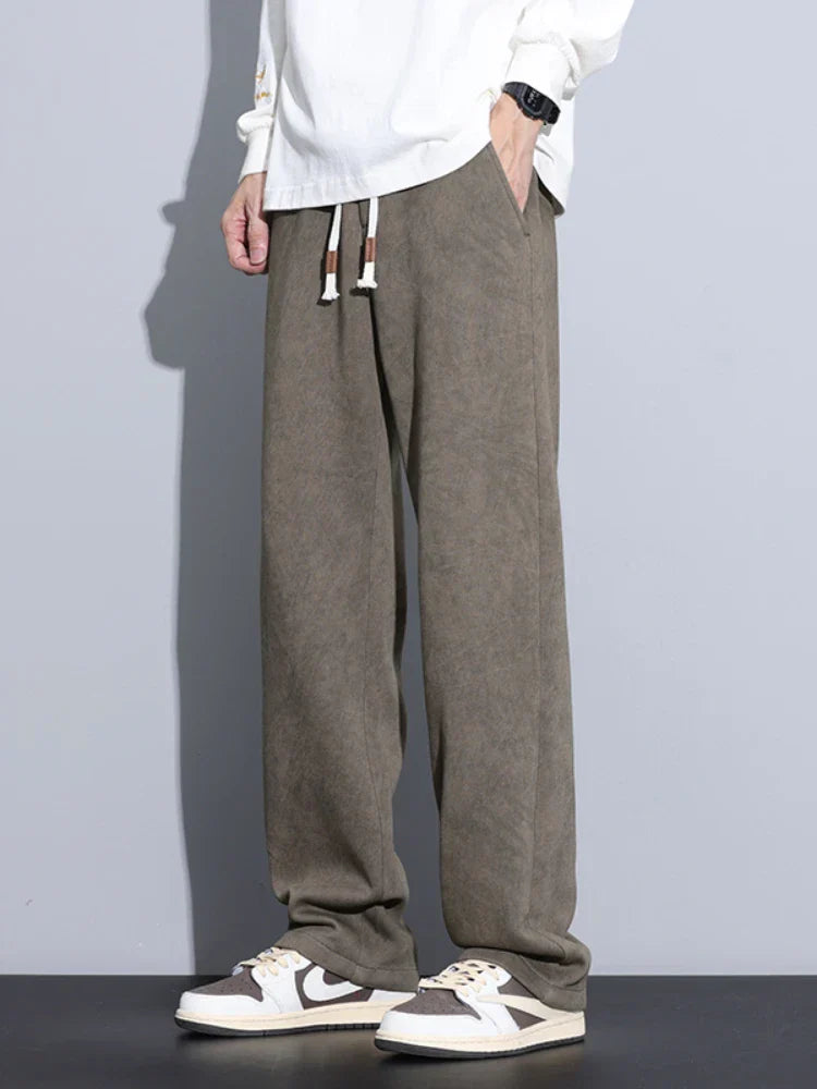 Dye-faded unisex sweatpants loose straight wide-leg cut soft cotton-poly blend lounge essential