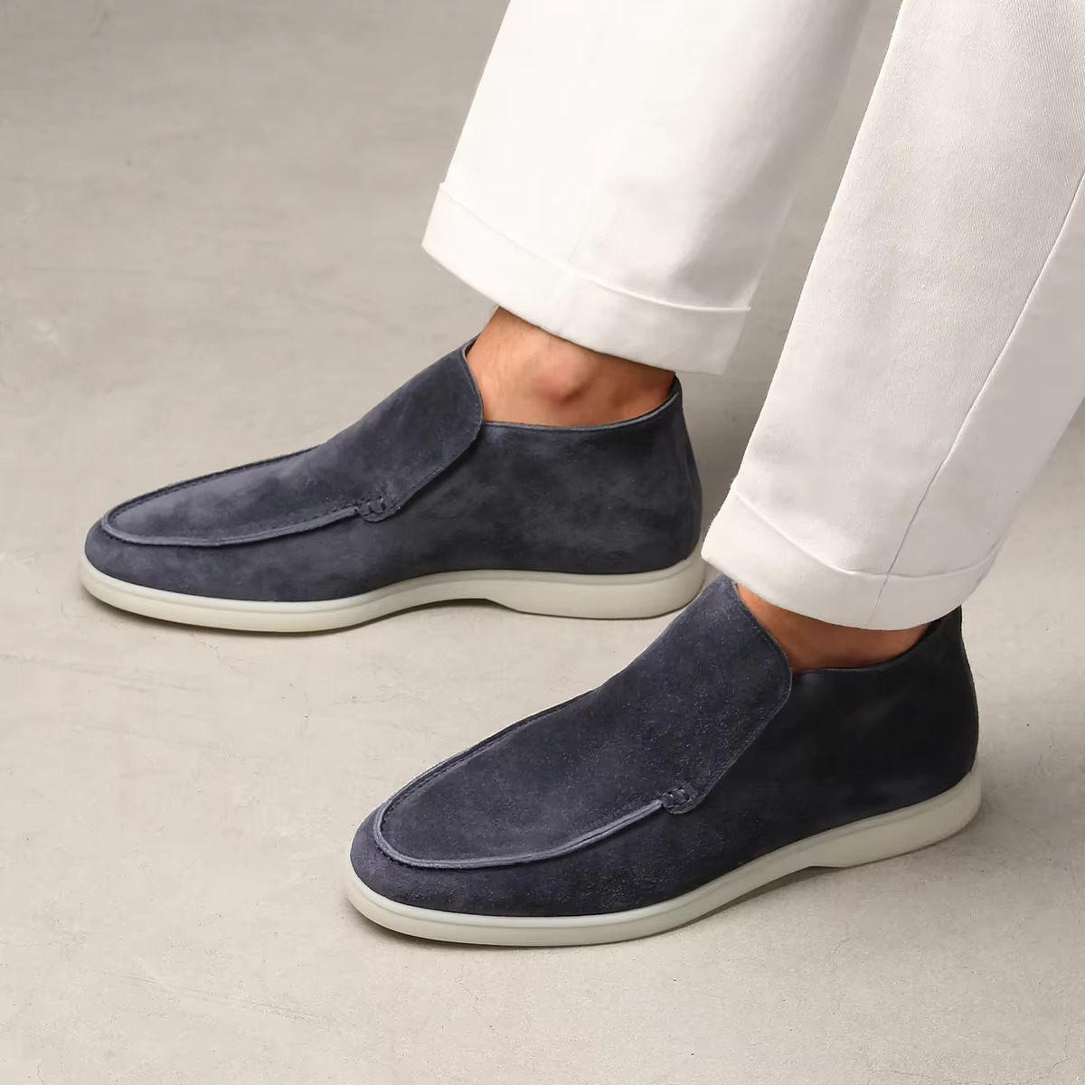 Men's brown suede leather slip-on loafers with flexible rubber sole, classic moccasin driving style