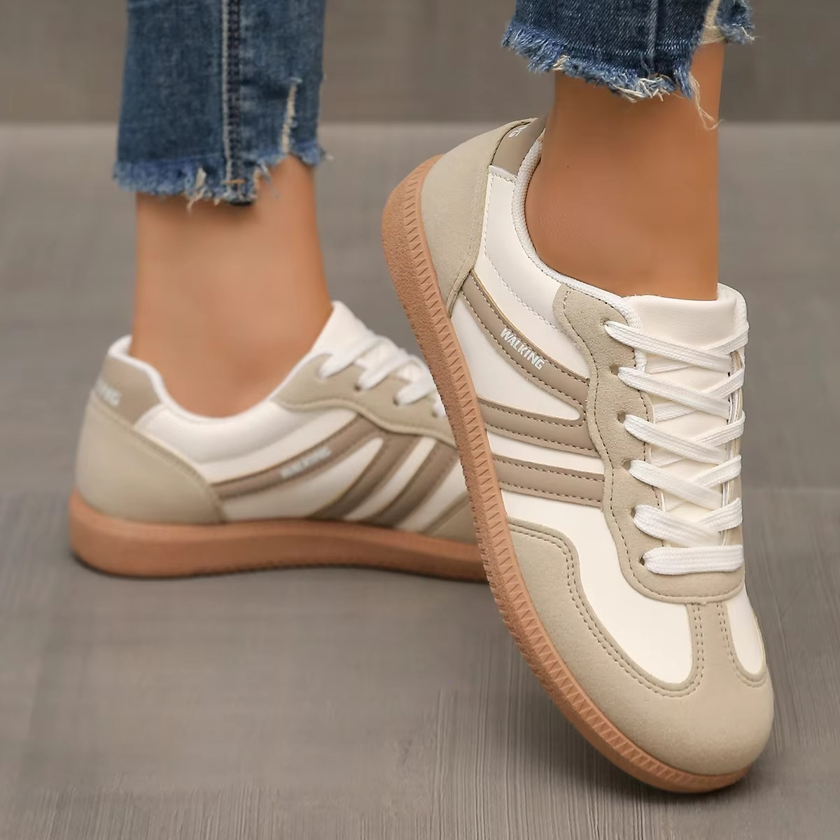 Women's slip-on sneakers in neutral tones, lightweight woven textile, effortless everyday flat silhouette