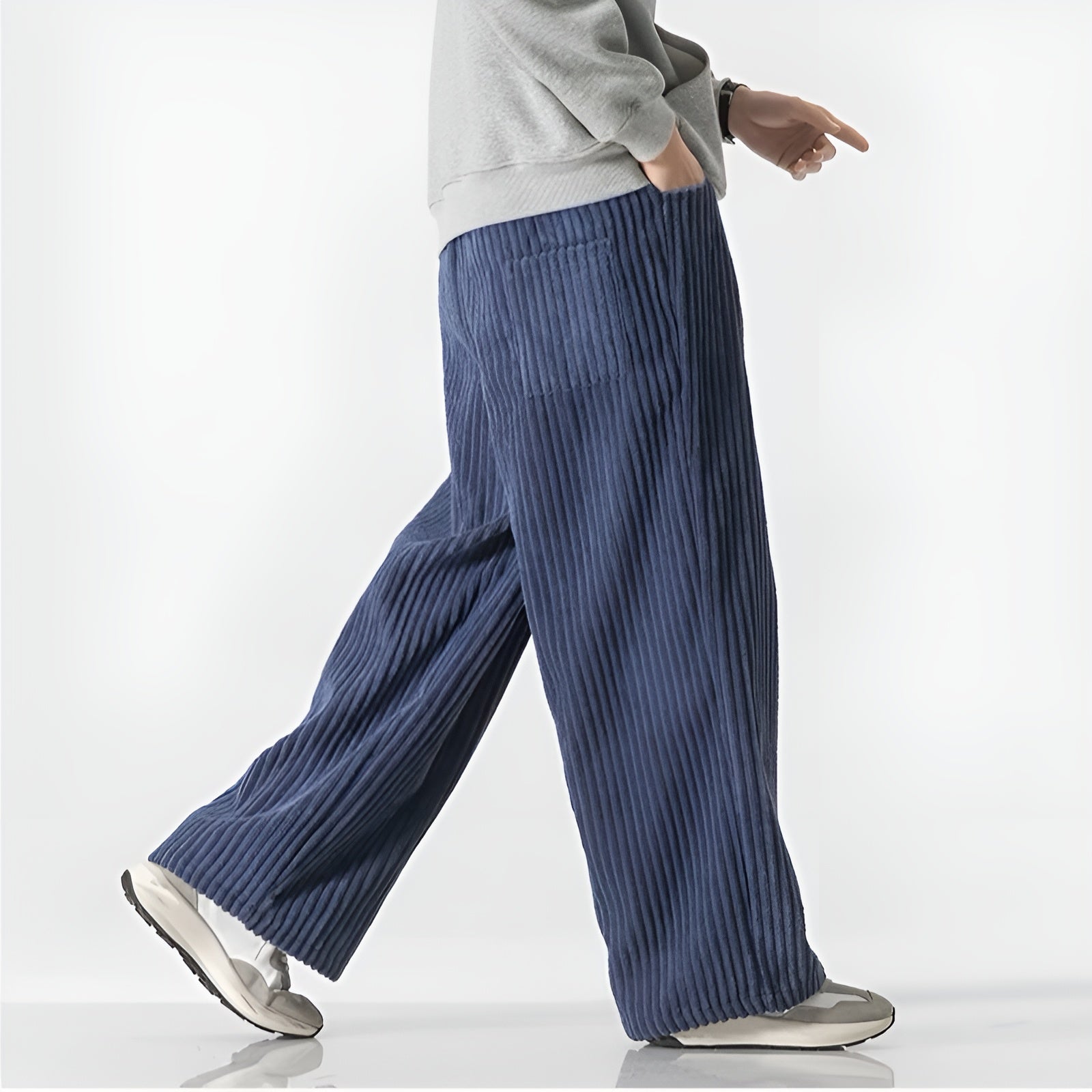 Relaxed corduroy pants in neutral tone with elastic drawstring waist and densely ribbed cotton blend fabric