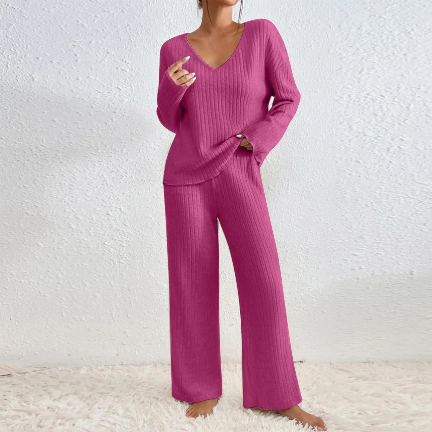 Women's ribbed two-piece lounge set matching sweater and pants in cozy relaxed-fit silhouette