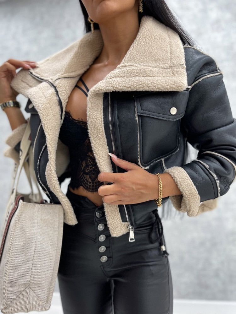 Women's cropped faux leather jacket slim fit zip closure with plush shearling lining in black