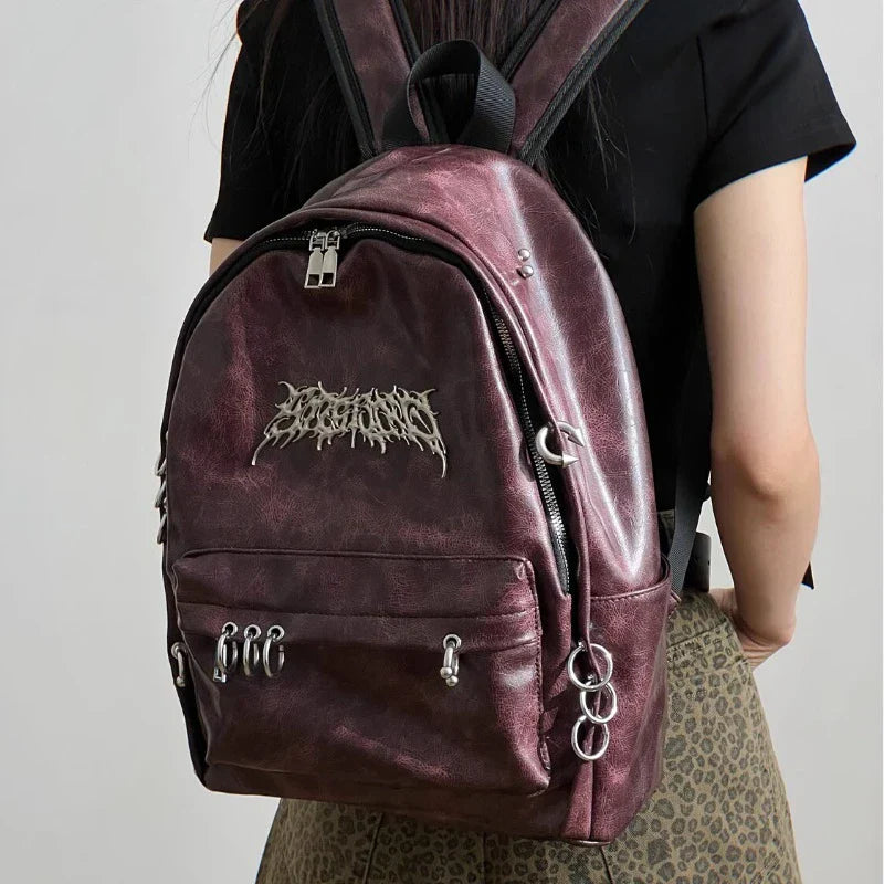 Gray gothic canvas backpack with metal ring accents, large capacity dark aesthetic raven design