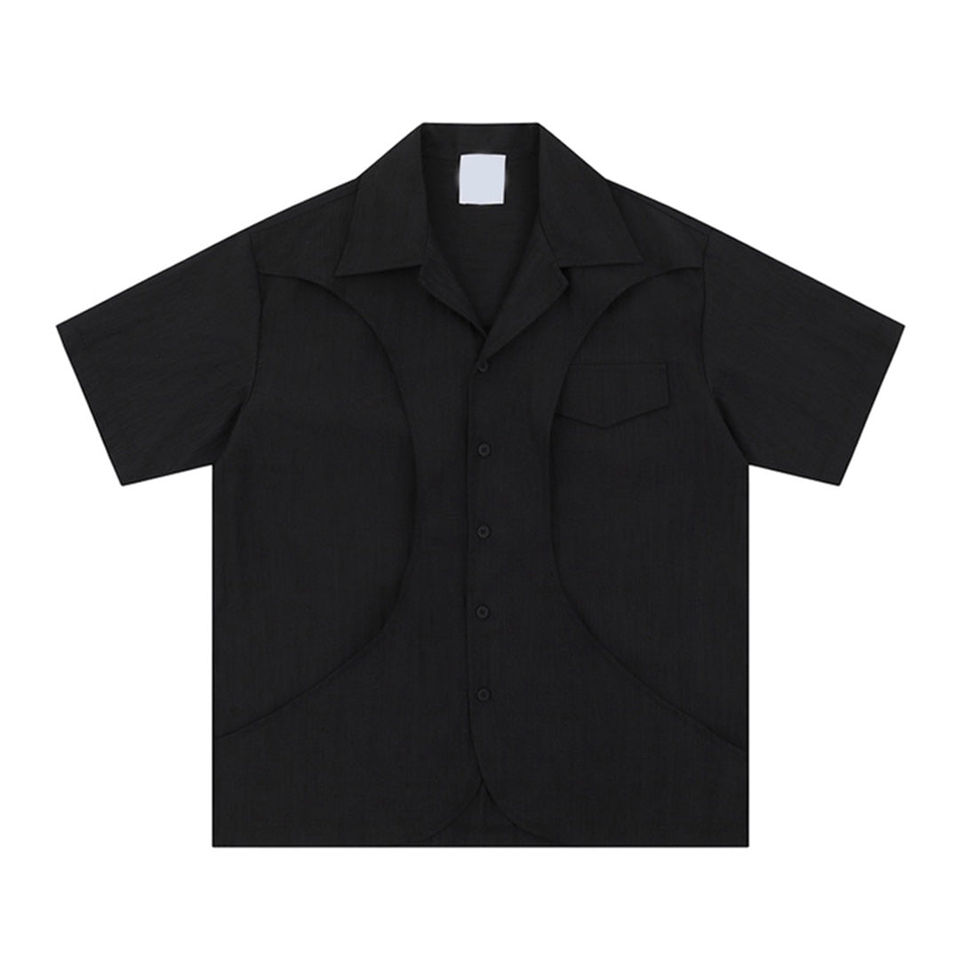 Neutral cotton shell shirt with turn-down collar, regular fit, and sculpted curved seams for minimalist layering