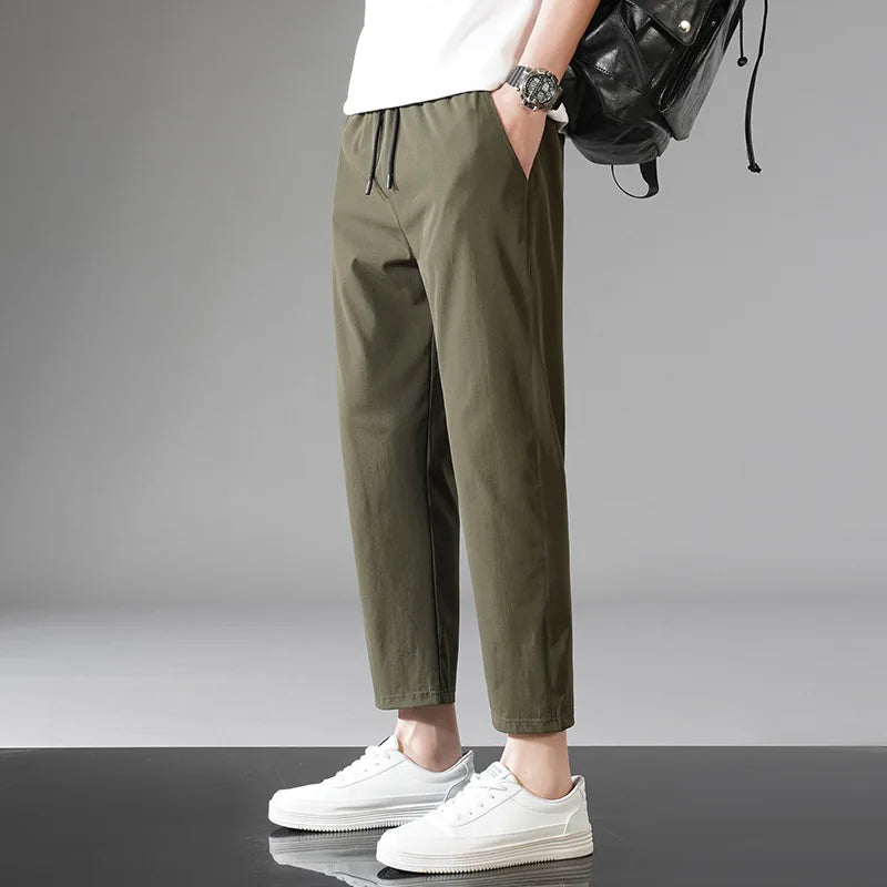 Black high-stretch activewear running pants with second-skin fit, lightweight moisture-wicking performance