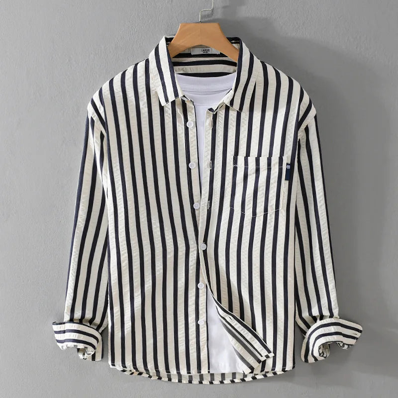 Men's blue striped long sleeve shirt with chest pocket, casual yet refined cotton blend everyday wear