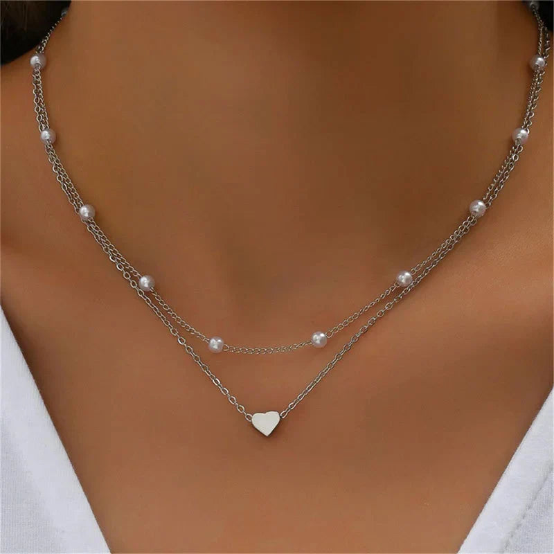 Lily gold three-layer bead chain necklace with delicate heart pendant, timeless stacked elegance